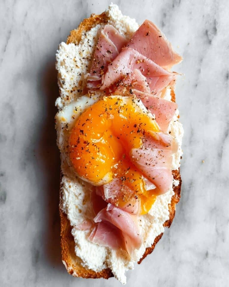 Fried Egg Yolk, Burrata and Prosciutto Toast Recipe