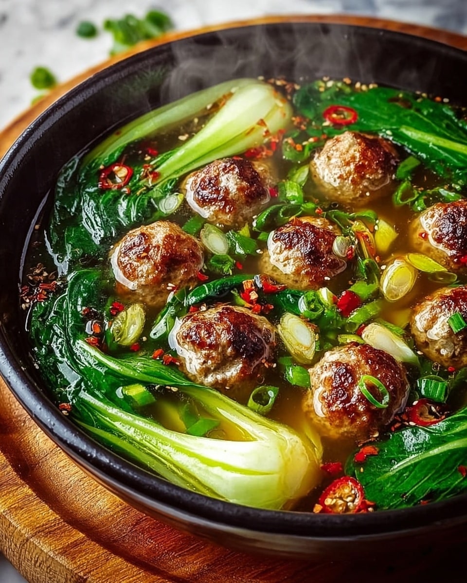 Ginger Chicken Meatball Soup with Baby Bok Choy and Wonton Strips Recipe - Recipe Image
